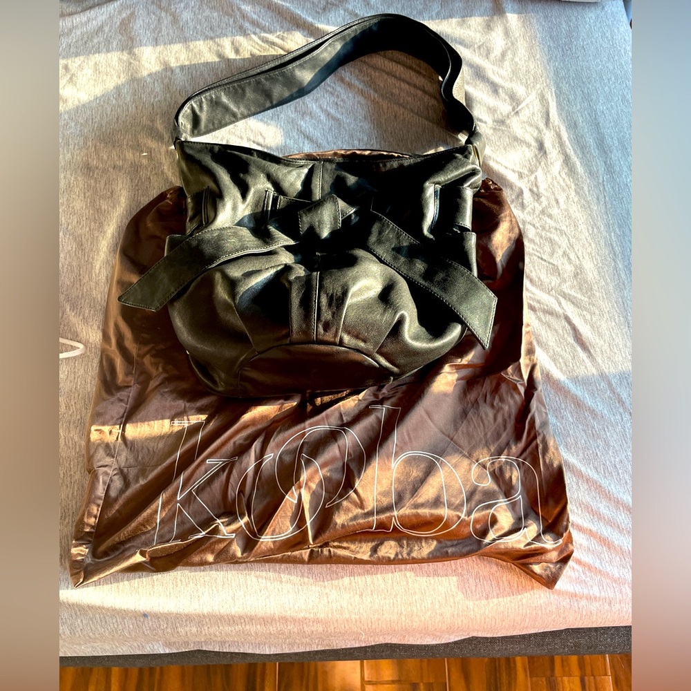 Kooba Black Leather Bucket Bag w Bow in excellent condition comes with dust bag